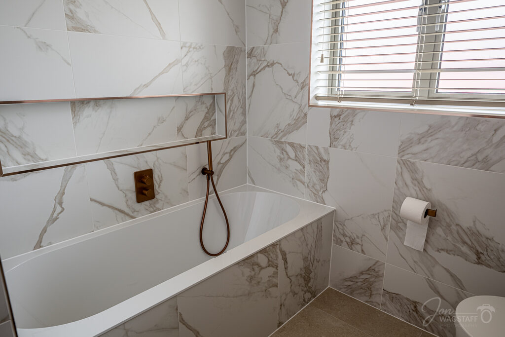 Marble ensuite bathroom at Warwick House, photographed by Jon Wagstaff