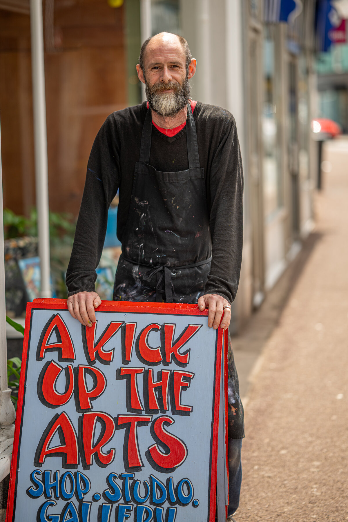A Kick Up The Arts shopfront portrait by Jon Wagstaff